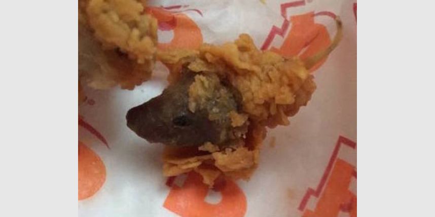 Woman says she found whole rat's head in Popeyes fried chicken meal