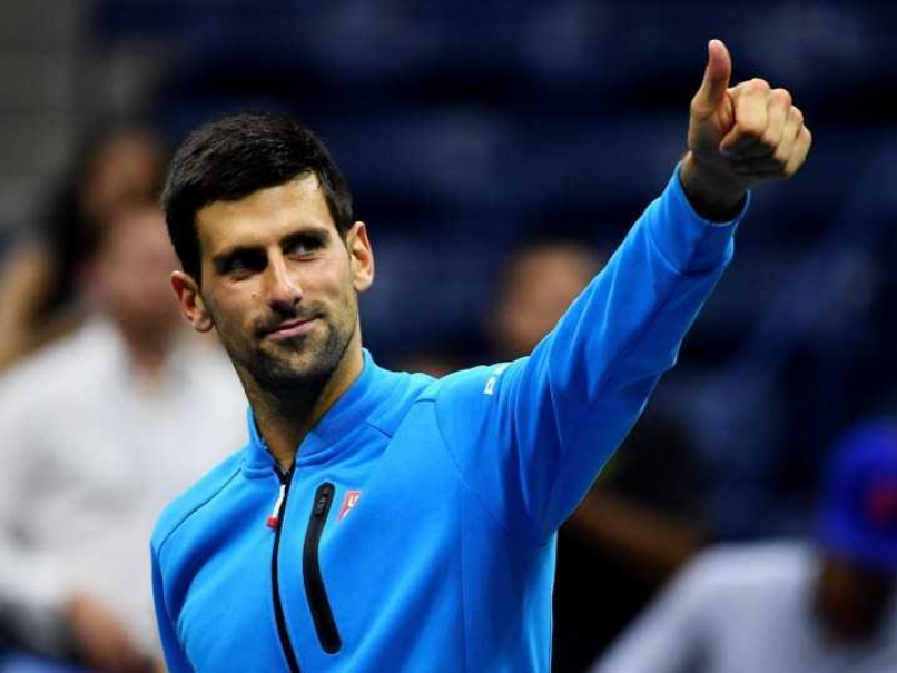 Djokovic advances to semis after another shortened match