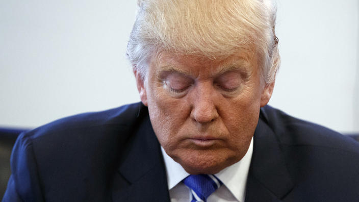 Trump apologises for lewd comments but calls footage a 'distraction'