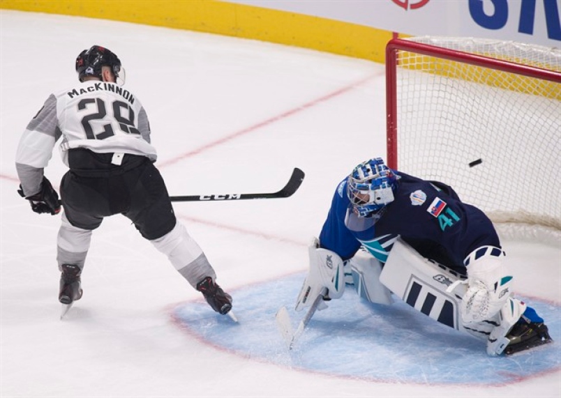 MacKinnon scores two as NA tops Europe 4-0