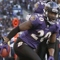 Ravens safety Ed Reed tries to motivate quarterback Joe Flacco